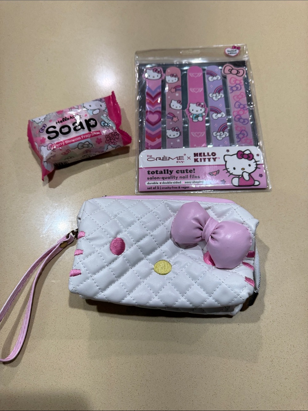 Hello Kitty Quilted White & Pink Wristlet Pouch with Bow, nail files and soap